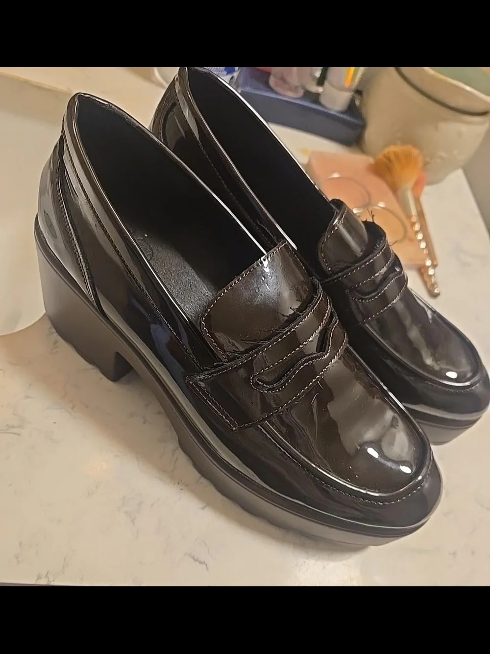 CUCCOO  patent platform penny loafers with chunky block heels and a sleek g